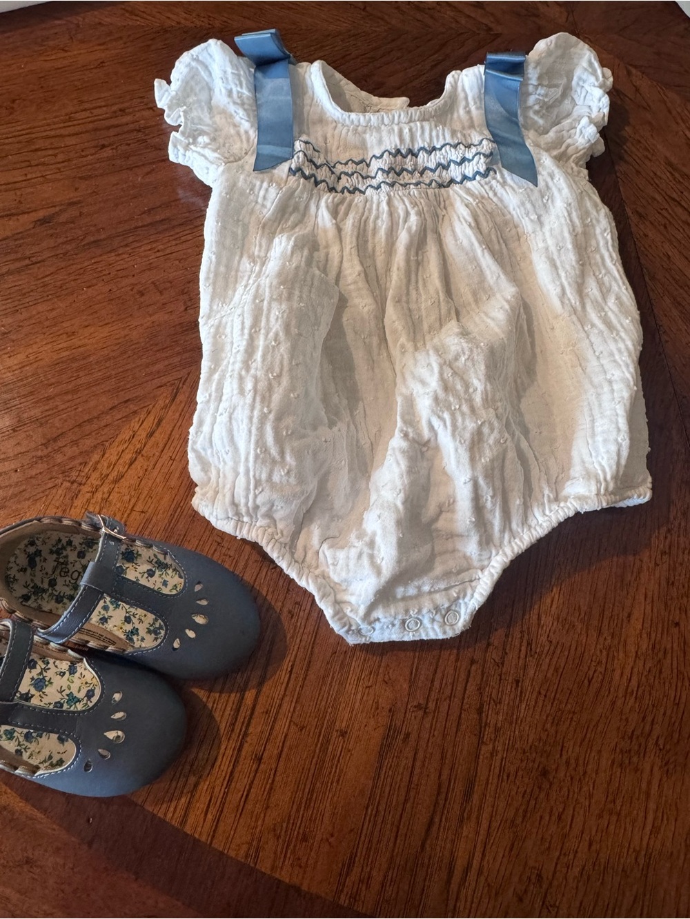 Caramel White Baby Romper with Blue Ribbon Shoulder Bows